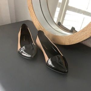 Selling my BCBG brand classic cream and black flats. New never worn.